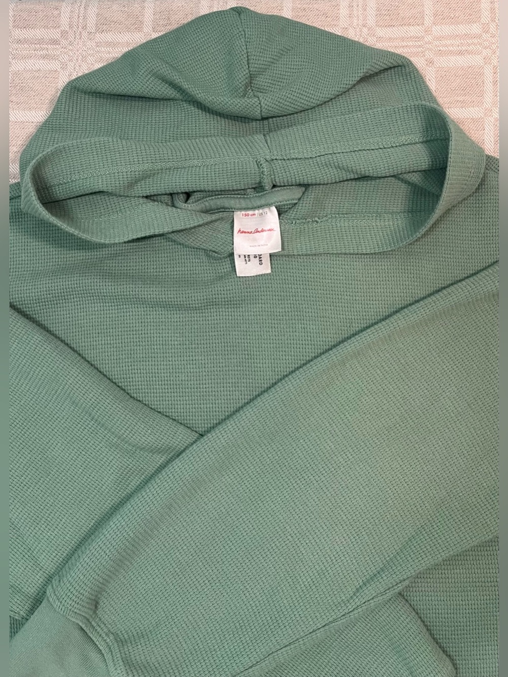 Hanna Andersson Green
Waffle Knit Hoodie Shirt made of 100% cotton.